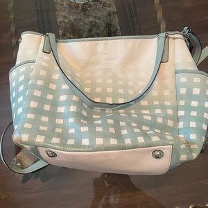 Coach baby bag! Has bottle holders and storage